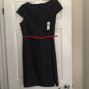 Women’s dress. NWT. Size 14. Denim material with red accent belt.